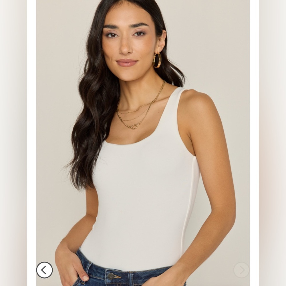 Francesca’s white bodysuit